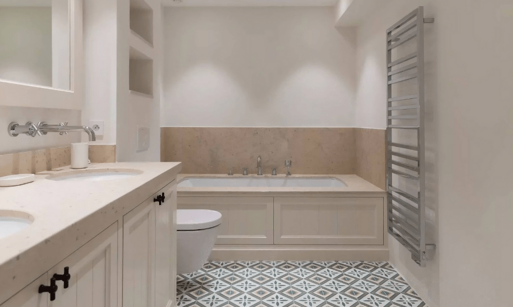 Luxurious bathroom featuring glass shower and marble finishes